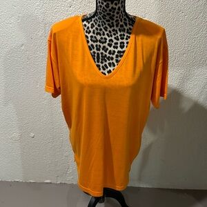 MJ Carroll orange sherbet color v-neck tee shirt. Never worn missing tags. BC